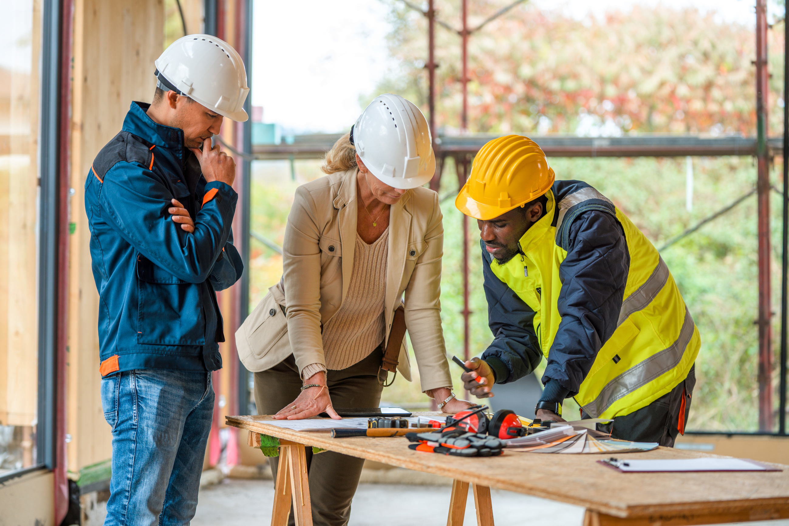 Female Engineer Outsources Construction Services